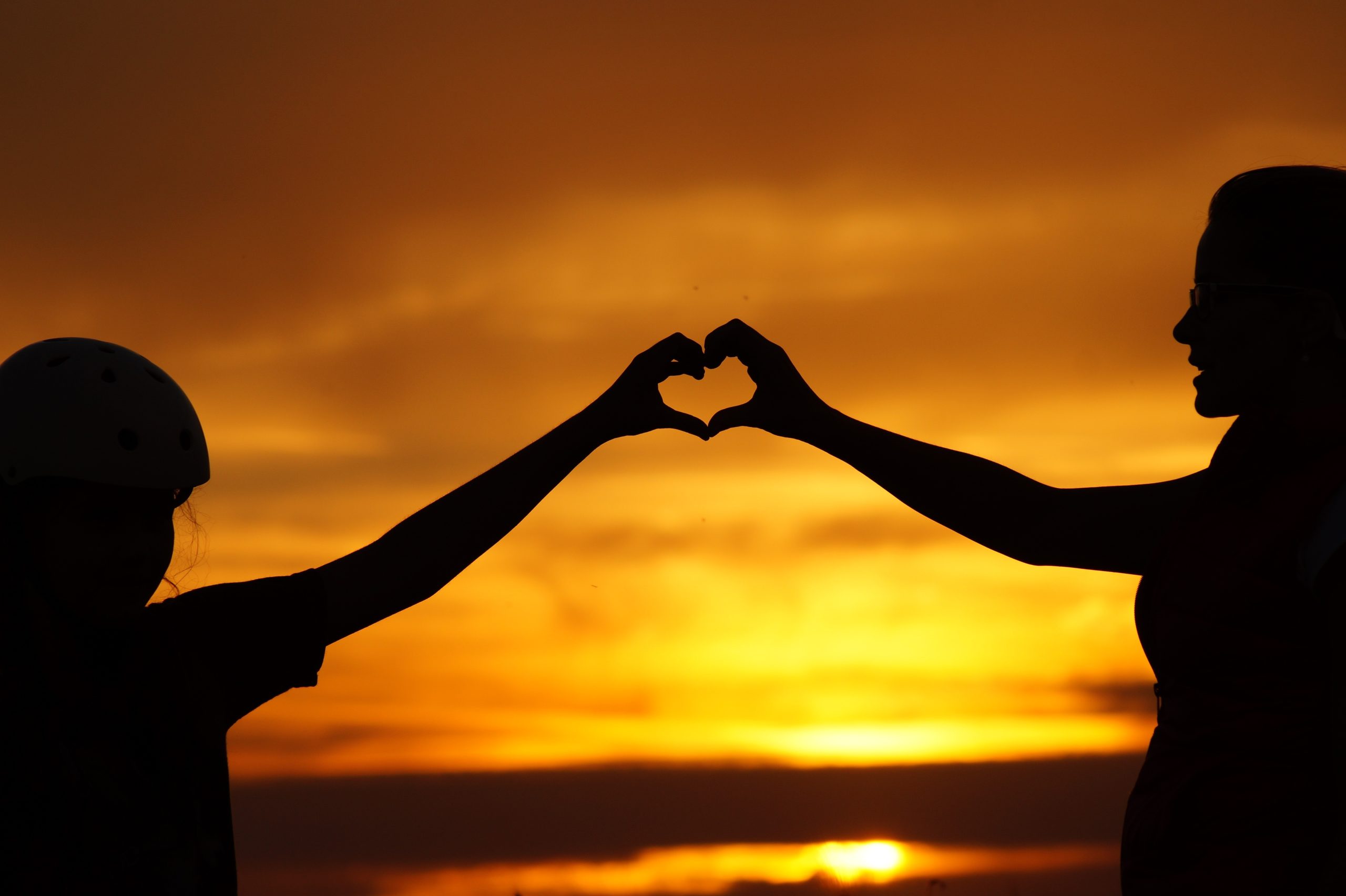 silhouette-of-man-touching-woman-against